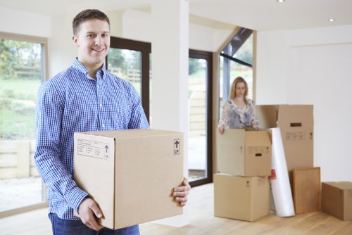 Professional movers handling furniture pick-up in Wimbledon